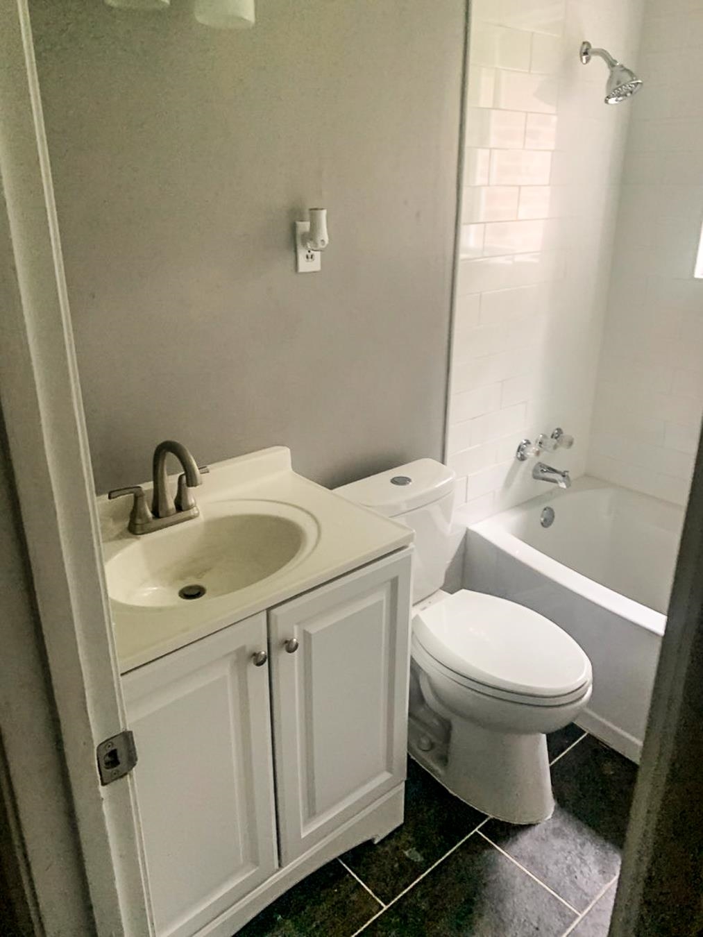 3909 Range Line Road Memphis, TN 38127 - Photo 29 of 31 a bathroom with a sink toilet and a mirror