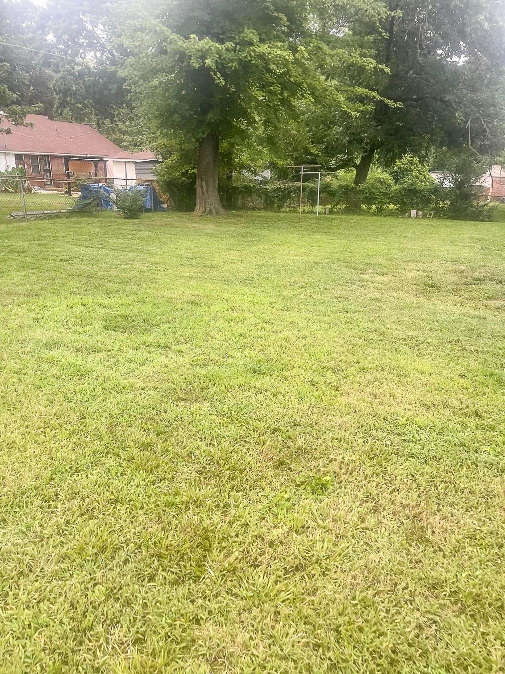 3909 Range Line Road Memphis, TN 38127 - Photo 30 of 31 a view of a pool with an outdoor space and seating area