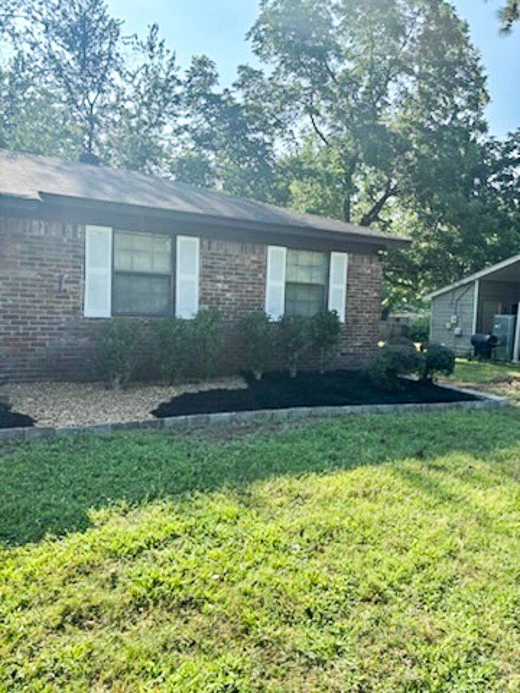 3909 Range Line Road Memphis, TN 38127 - Photo 6 of 31 a front view of house with yard and green space