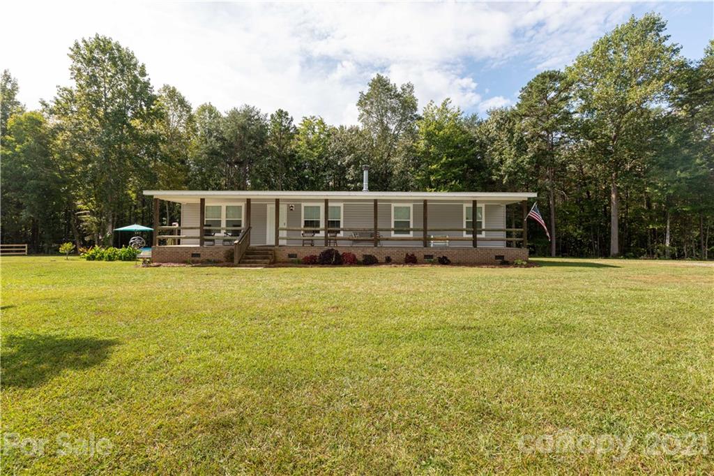 1824 Ebenezer Road Smyrna, SC 29743 - Photo 1 of 47 a view of a house with a big yard