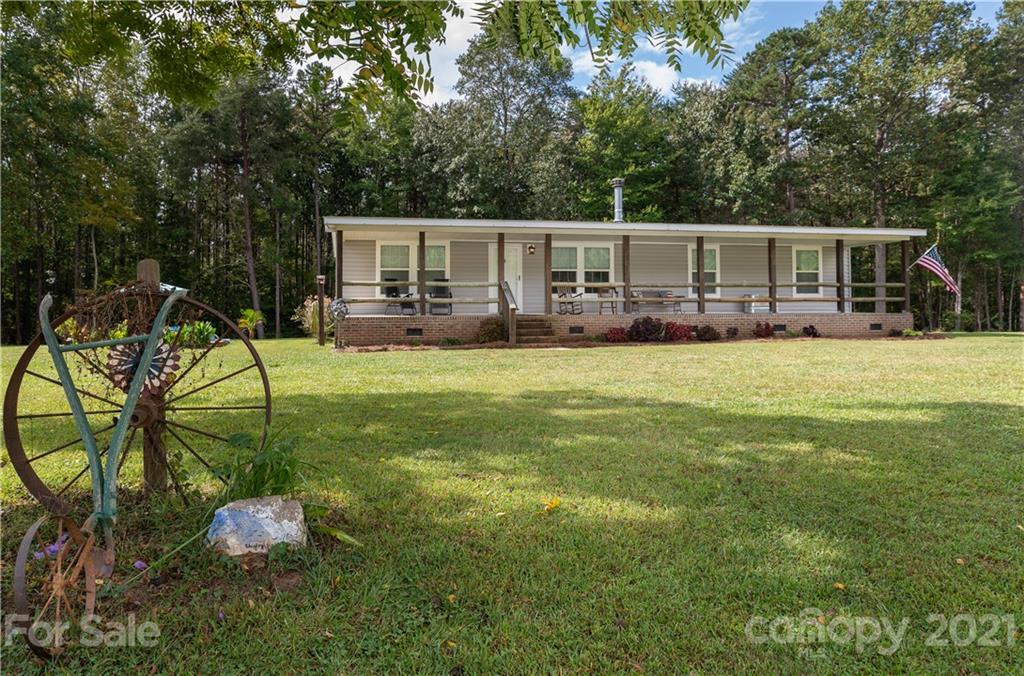 1824 Ebenezer Road Smyrna, SC 29743 - Photo 2 of 47 a view of a house with a yard