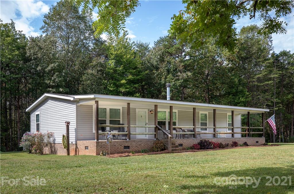 1824 Ebenezer Road Smyrna, SC 29743 - Photo 3 of 47 a view of a house with a yard