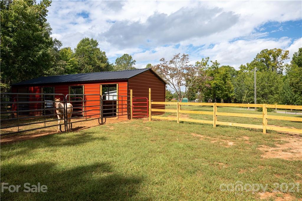 1824 Ebenezer Road Smyrna, SC 29743 - Photo 5 of 47 a view of a backyard