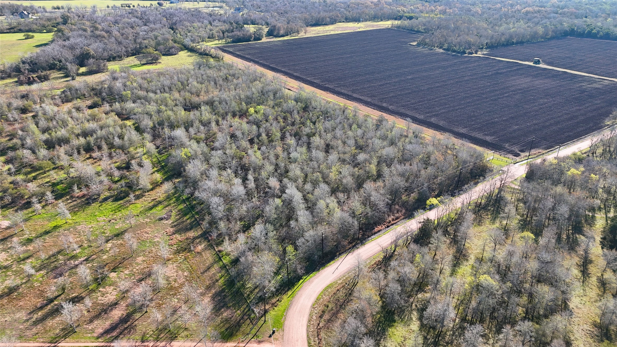 5000 Brewer Road Sealy, TX 77474 - Photo 4 of 8 a view of a wooden floor