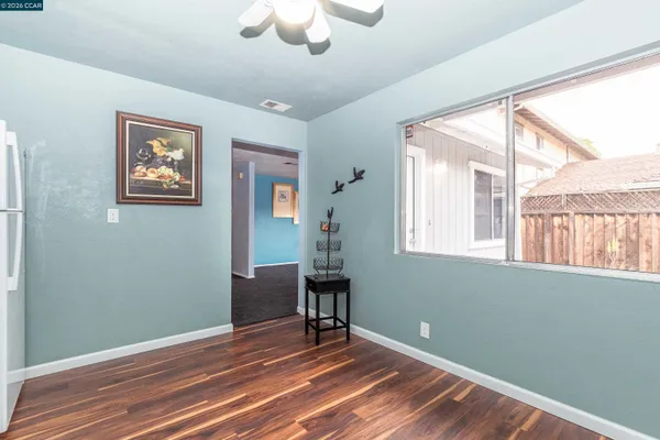 a view of a utility room with cabinet and utility room
