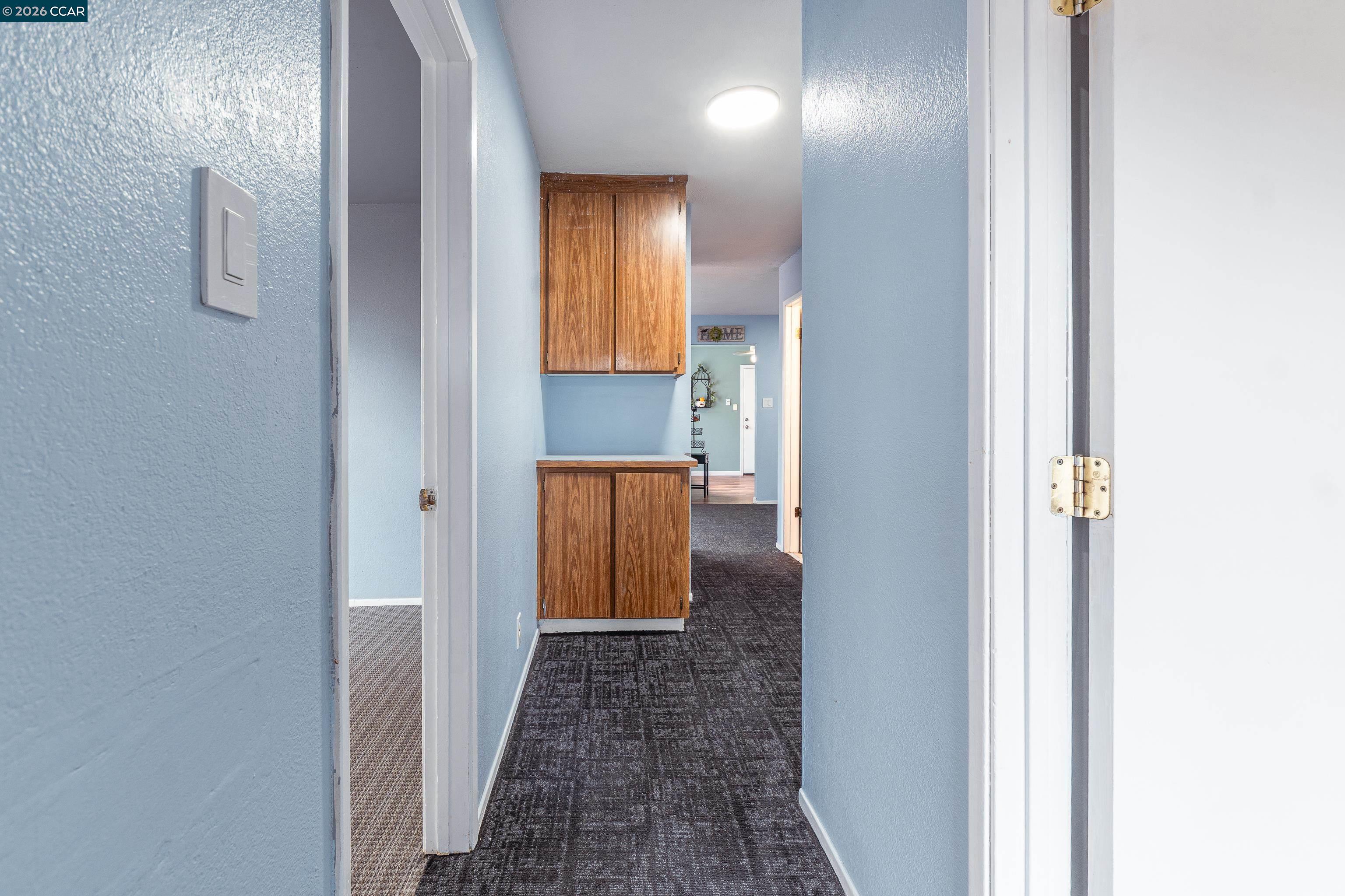 1730 Springwood Way Antioch, CA 94509 - Photo 13 of 26 a view of a hallway with wooden floor