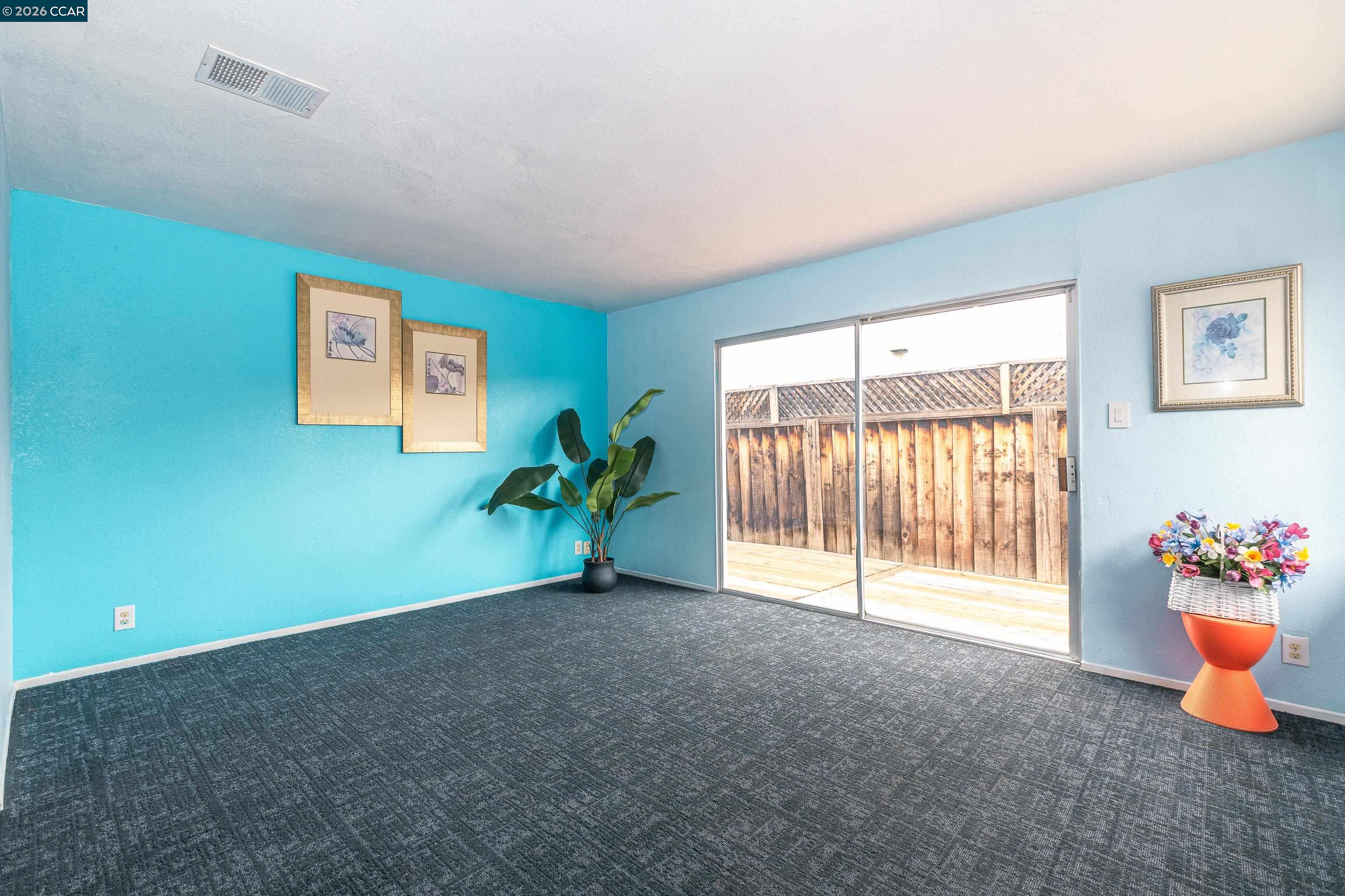 1730 Springwood Way Antioch, CA 94509 - Photo 7 of 26 a view of an empty room with a window