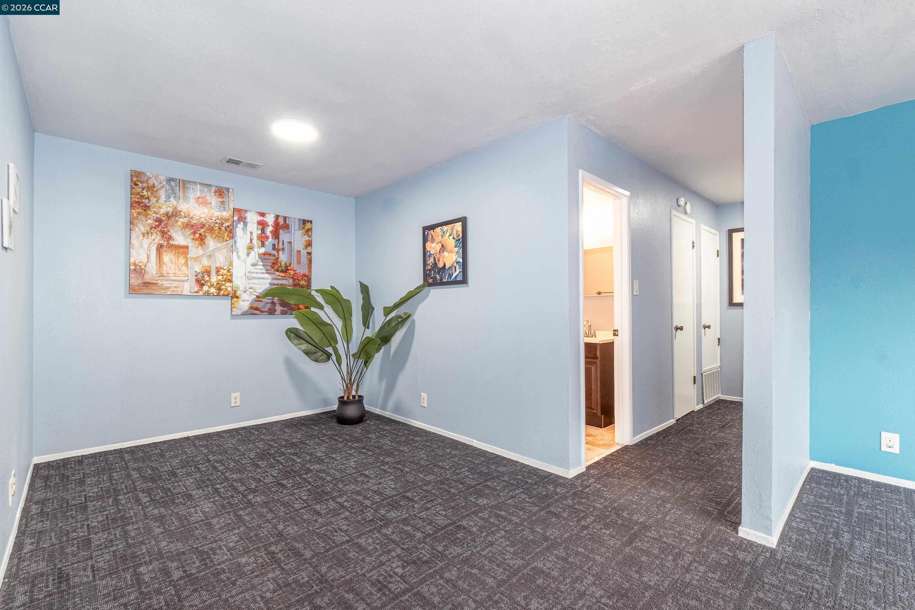 1730 Springwood Way Antioch, CA 94509 - Photo 9 of 26 a view of a livingroom with a staircase