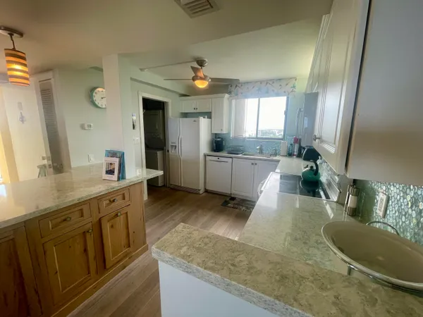 a view of a living room and dining room