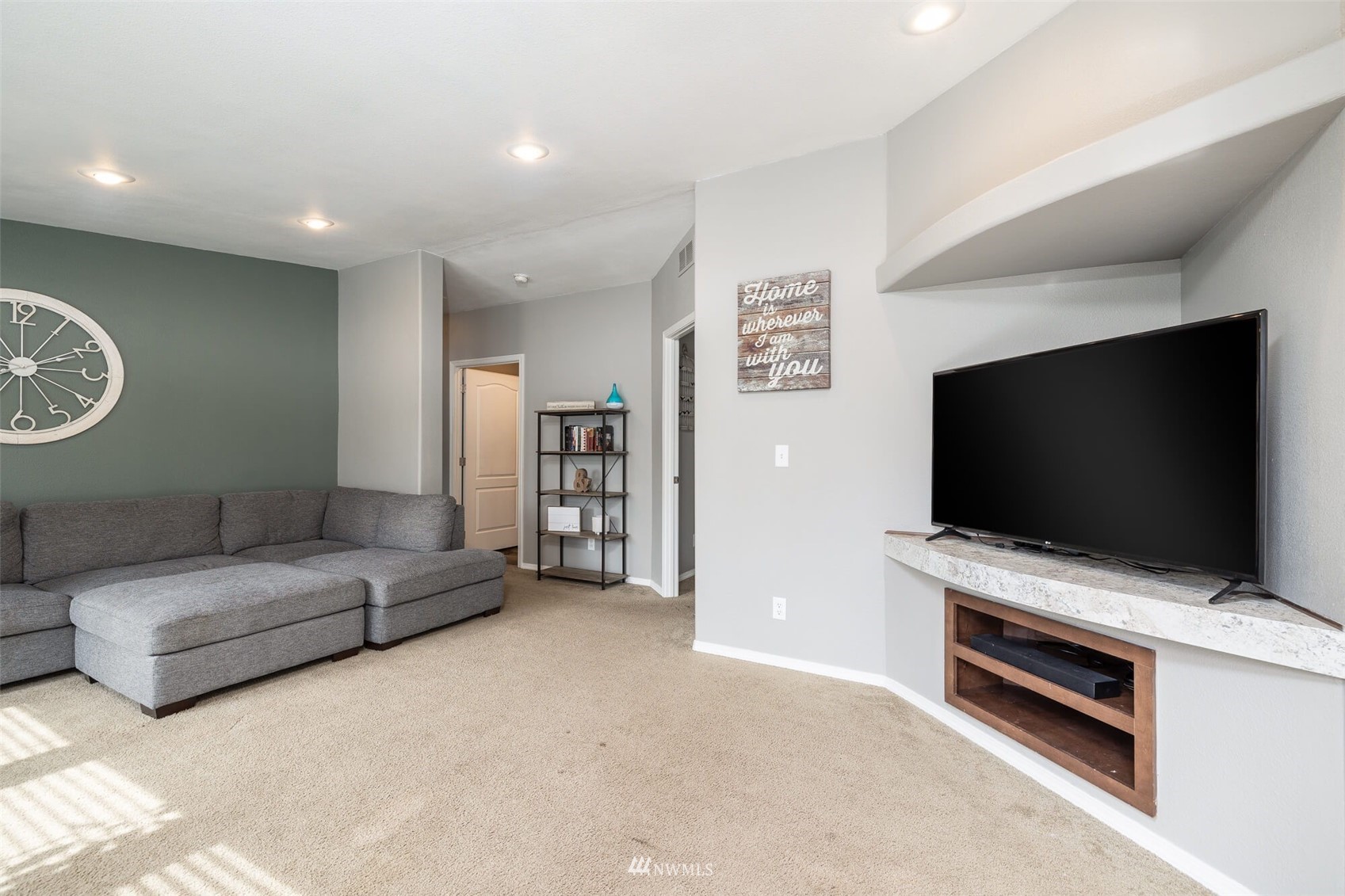 8301 Custer Road Southwest Lakewood, WA 98499 - Photo 3 of 34 a living room with furniture and a flat screen tv