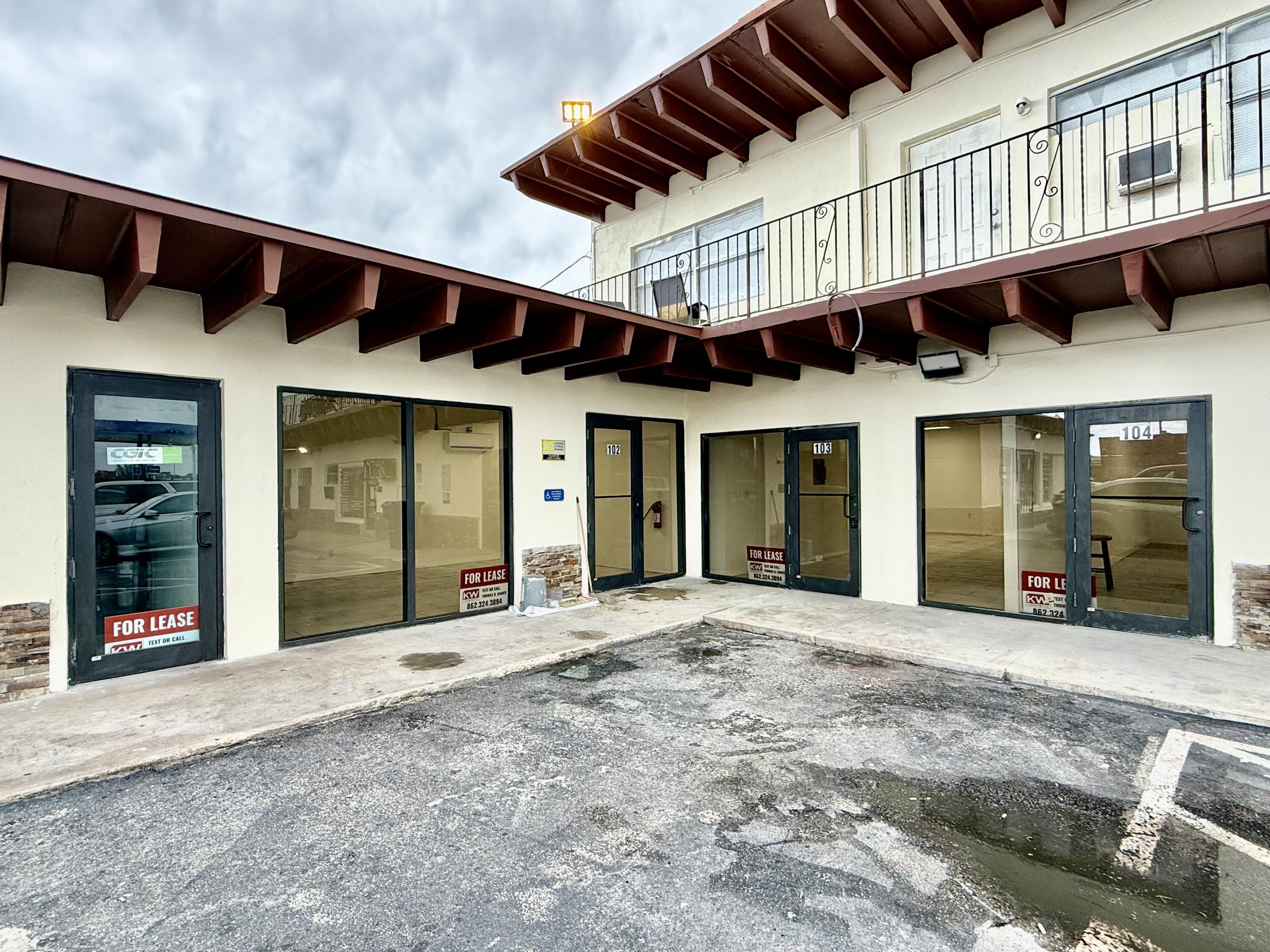 a front view of a building with a entryway