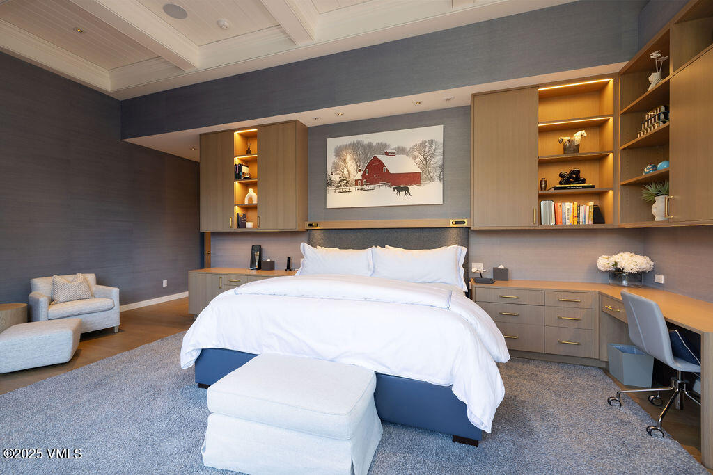 254 Beaver Dam Road Vail, CO 81657 - Photo 26 of 46 a bedroom with a bed and a couch