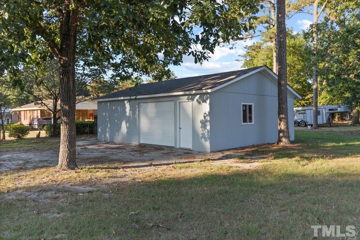 633 Outlaw Road Dudley, NC 28333 - Photo 8 of 28 a view of a house with a yard
