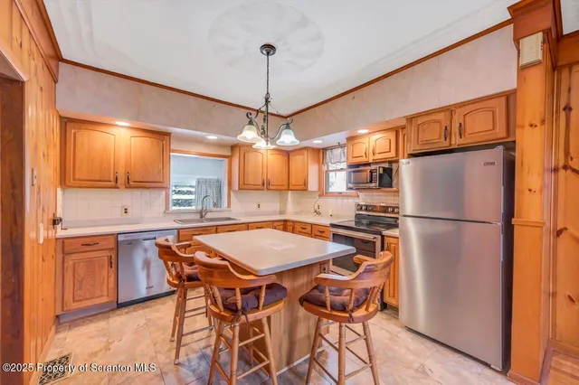 a view of a room with wooden walls