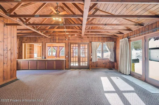 a view of a hallway with closet area