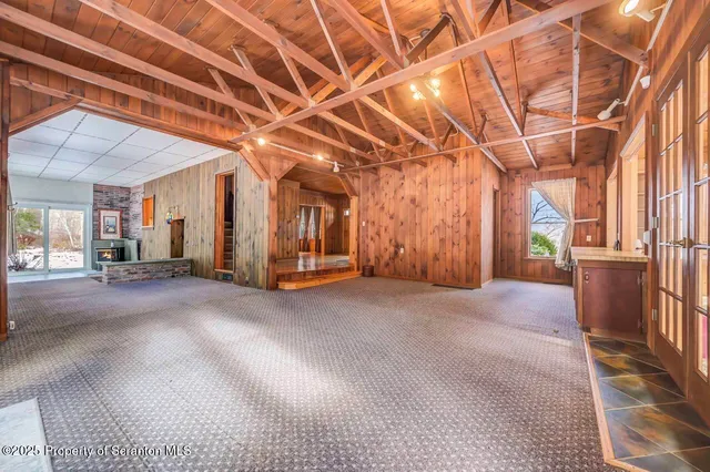 a bathroom with a sink a mirror and a bathtub