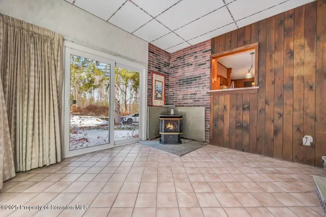 a view of a room with furniture window and wooden floor