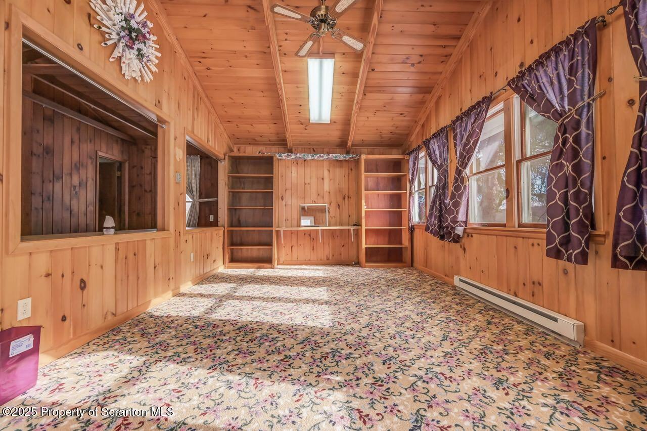 9 Marcy Road Tunkhannock, PA 18657 - Photo 39 of 97 a view of a house with a door and wooden walls
