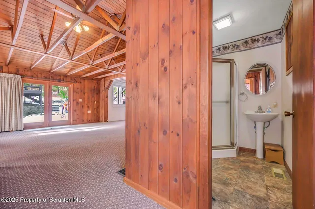 a view of a house with a snow in the yard