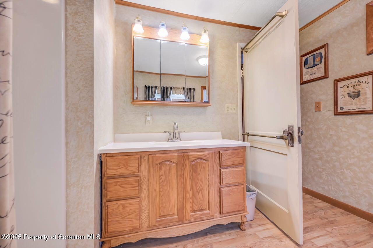 9 Marcy Road Tunkhannock, PA 18657 - Photo 58 of 97 a bathroom with a sink a mirror and a bathtub