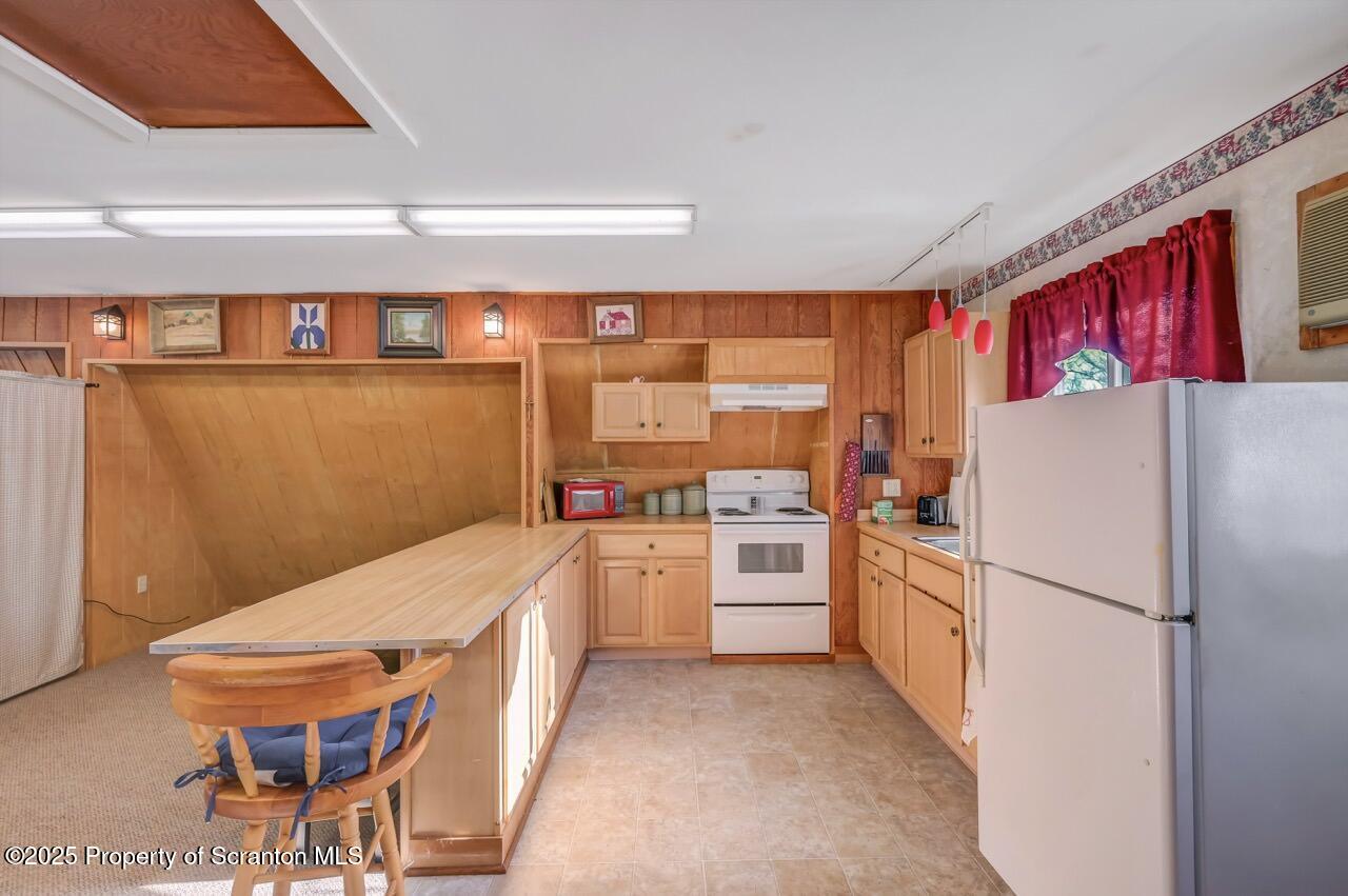 9 Marcy Road Tunkhannock, PA 18657 - Photo 73 of 97 a kitchen with stainless steel appliances a refrigerator a stove a sink and a refrigerator