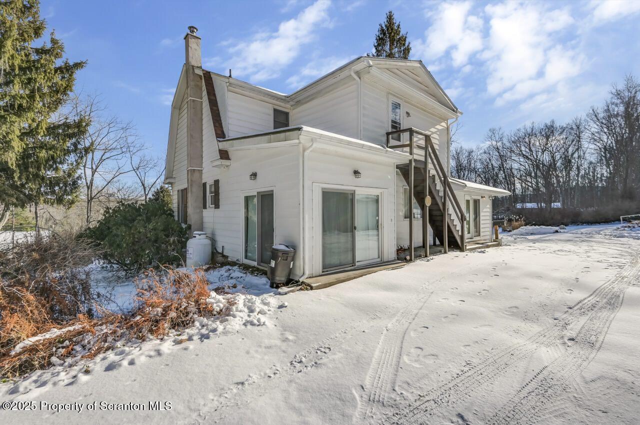 9 Marcy Road Tunkhannock, PA 18657 - Photo 87 of 97 a view of a house with a snow in the yard