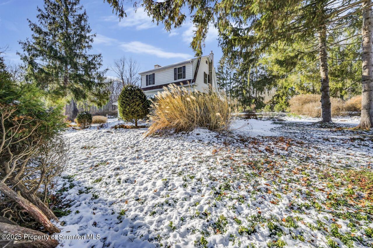 9 Marcy Road Tunkhannock, PA 18657 - Photo 88 of 97 a view of a yard with a tree in the background