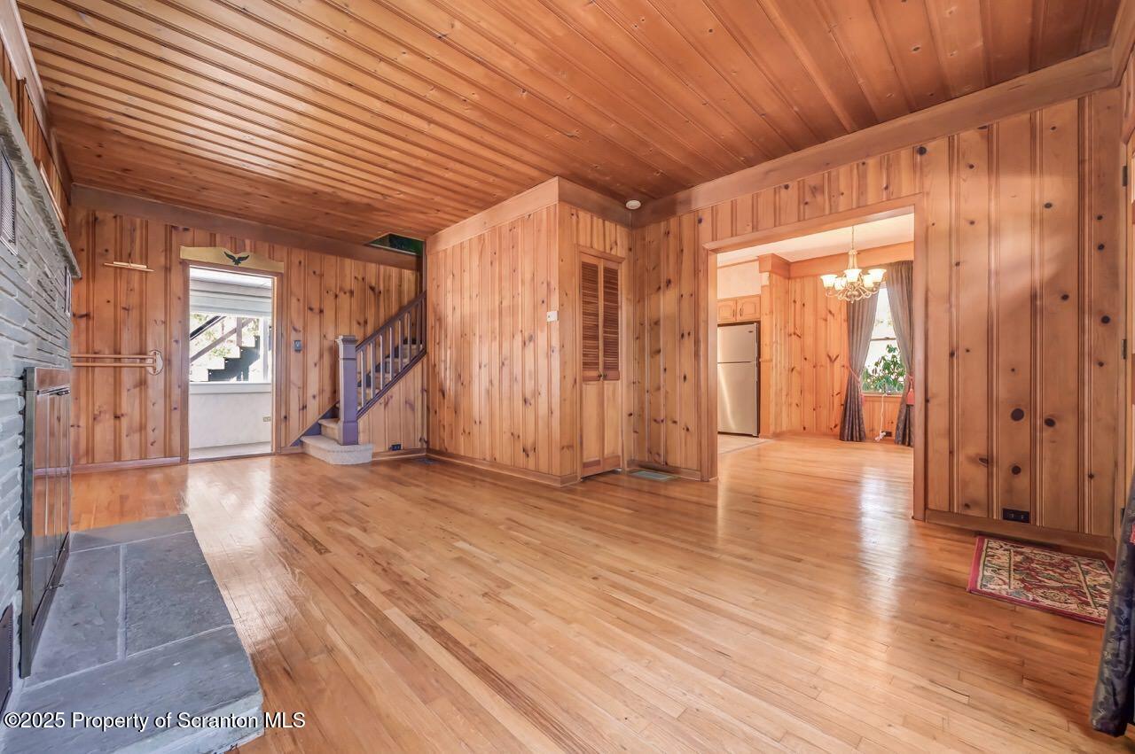 9 Marcy Road Tunkhannock, PA 18657 - Photo 10 of 97 a view of an empty room with wooden floor and a window