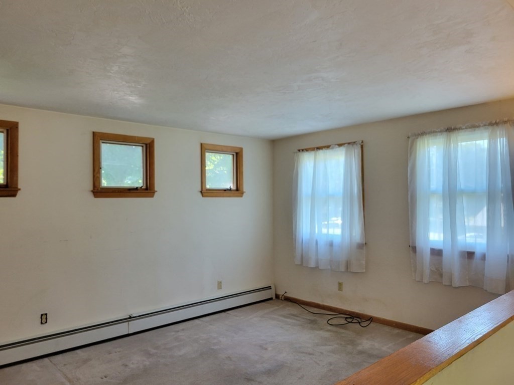 38 Bigelow Road Lancaster, MA 01523 - Photo 20 of 26 an empty room with windows