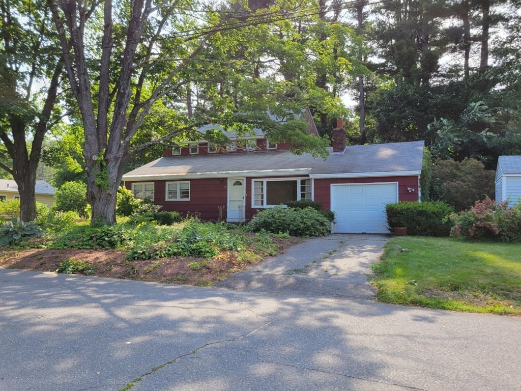 38 Bigelow Road Lancaster, MA 01523 - Photo 2 of 26 a front view of house with yard and green space