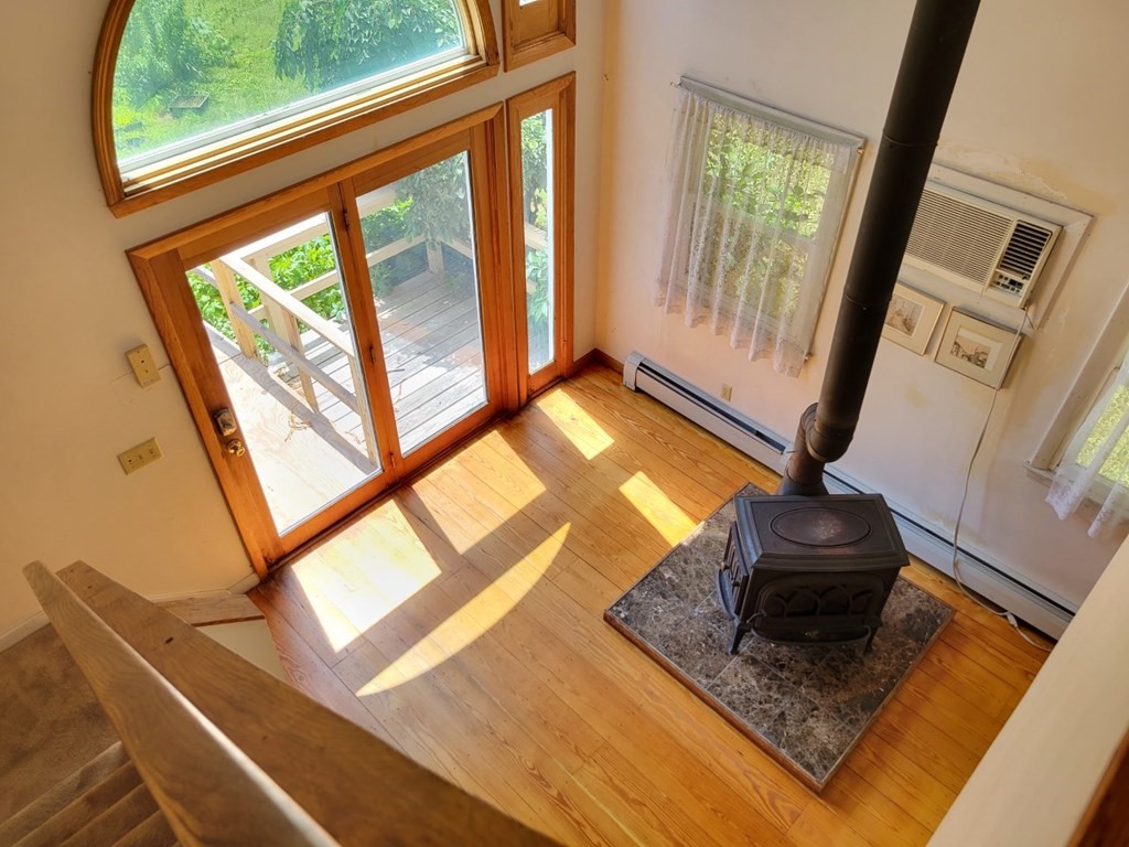 38 Bigelow Road Lancaster, MA 01523 - Photo 3 of 26 workspace with wooden floor