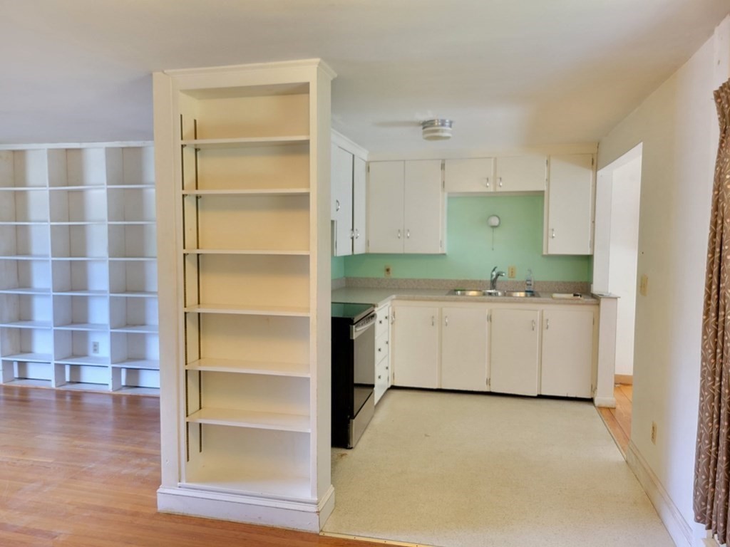 38 Bigelow Road Lancaster, MA 01523 - Photo 8 of 26 a utility room with cabinets