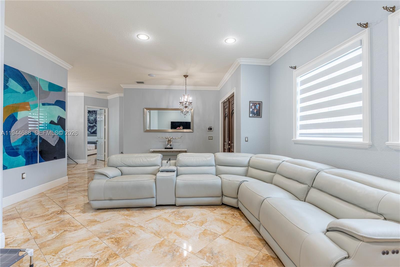 26602 Southwest 149th Court Homestead, FL 33032 - Photo 27 of 66 a living room with furniture and a large window