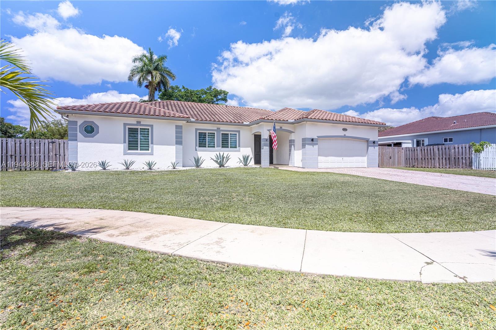 26602 Southwest 149th Court Homestead, FL 33032 - Photo 3 of 66 a view of a house with a garden