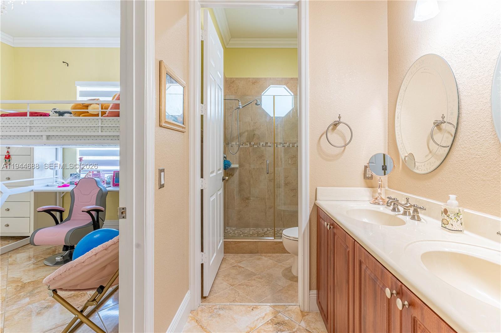 26602 Southwest 149th Court Homestead, FL 33032 - Photo 36 of 66 a bathroom with a sink and a mirror