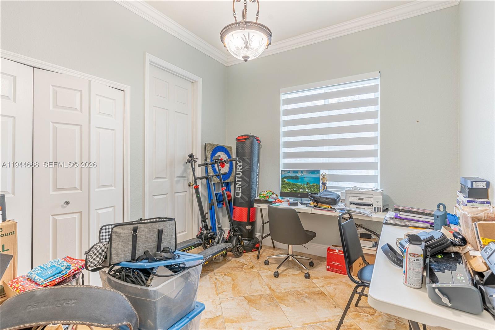 26602 Southwest 149th Court Homestead, FL 33032 - Photo 42 of 66 a view of a livingroom with workspace and a window