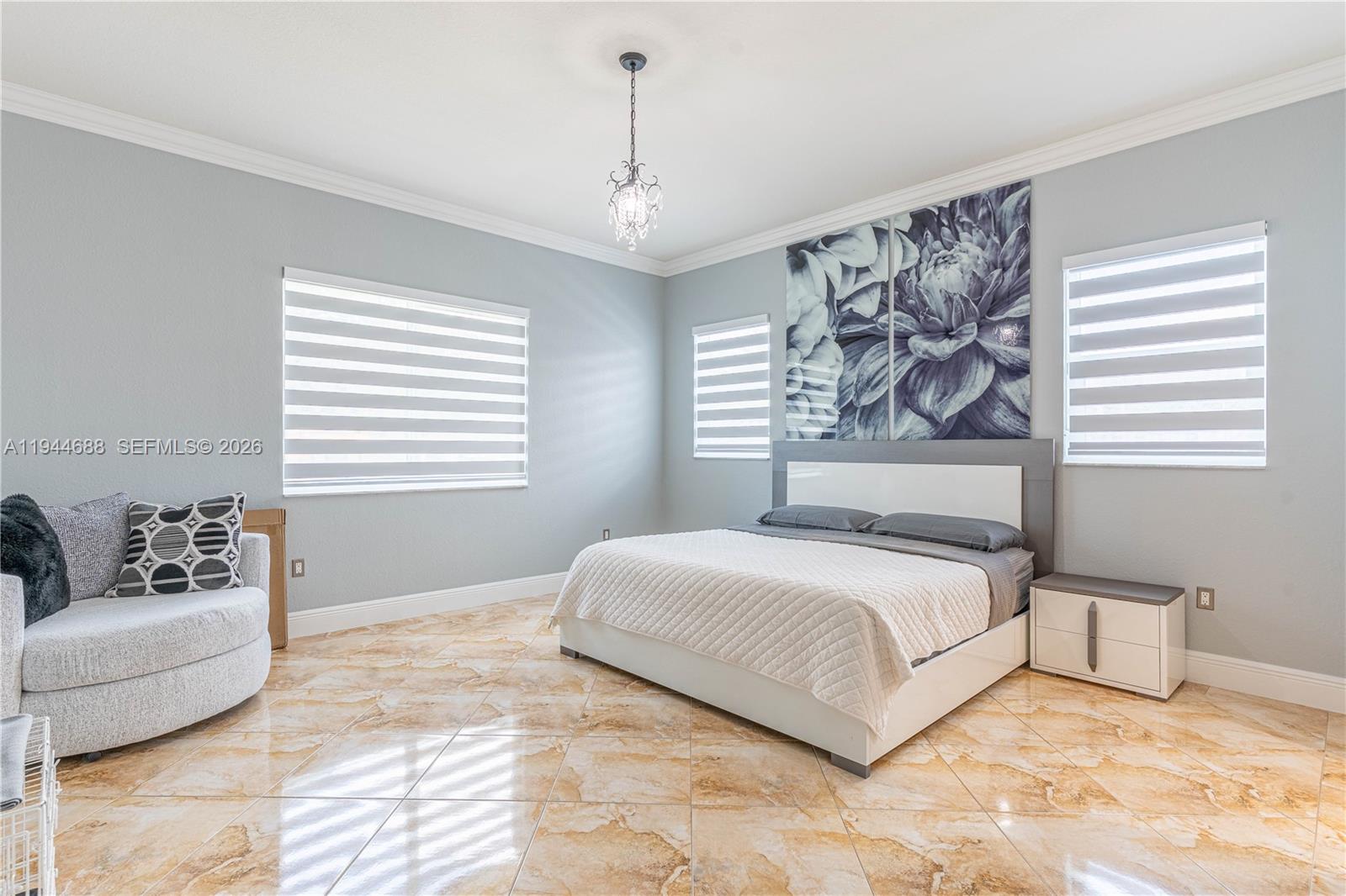 26602 Southwest 149th Court Homestead, FL 33032 - Photo 47 of 66 a bedroom with a bed couches and window