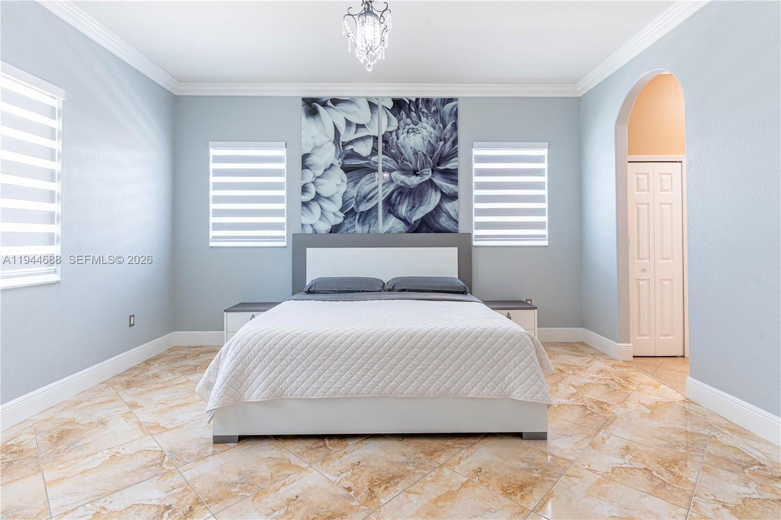 26602 Southwest 149th Court Homestead, FL 33032 - Photo 48 of 66 a bedroom with a bed and window