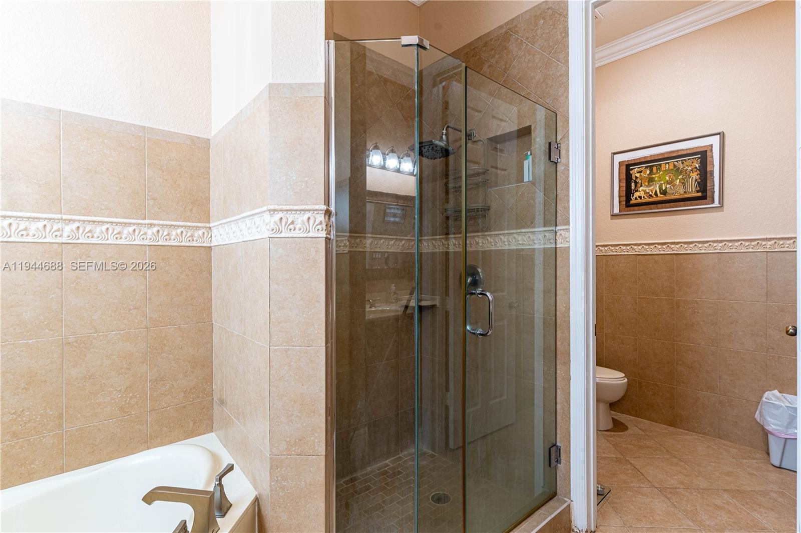 26602 Southwest 149th Court Homestead, FL 33032 - Photo 52 of 66 a bathroom with a shower and a toilet