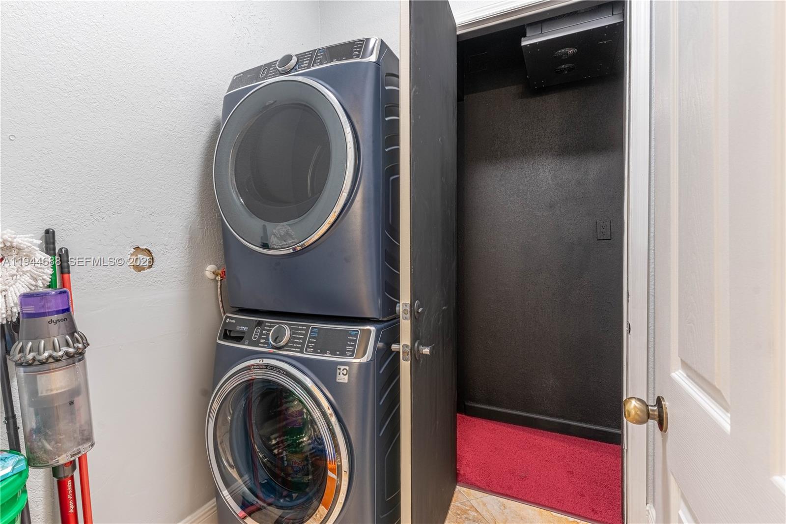 26602 Southwest 149th Court Homestead, FL 33032 - Photo 55 of 66 a view of a bedroom with washer and dryer
