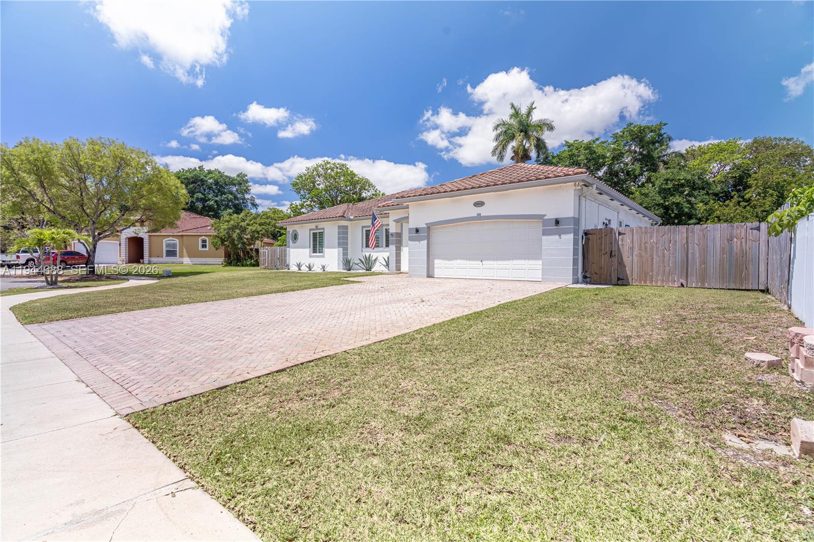 26602 Southwest 149th Court Homestead, FL 33032 - Photo 7 of 66 a house view with a outdoor space