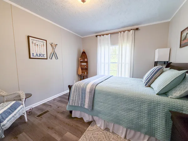 a spacious bathroom with a tub shower and sink