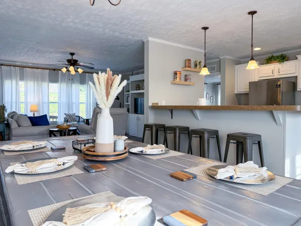 a view of a dining room and livingroom furniture