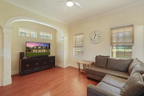 a kitchen with a stove a sink and a refrigerator