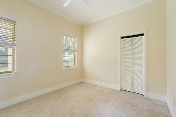 a bath room with a sink and a mirror