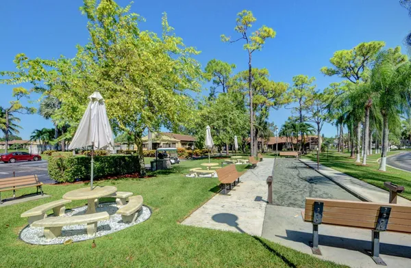 a garden view with a sitting space