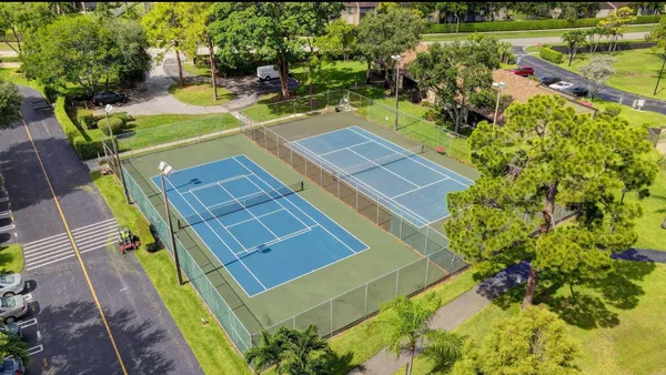 a view of a swimming pool with a patio