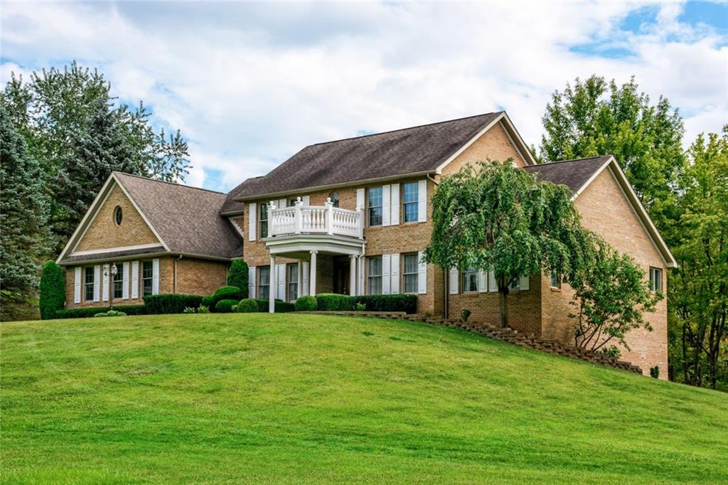 322 Stoup Road Mars, PA 16046 - Photo 1 of 25 a front view of house with yard and green space