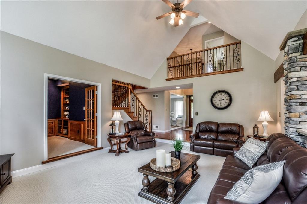 322 Stoup Road Mars, PA 16046 - Photo 11 of 25 a living room with furniture a window and wooden floor