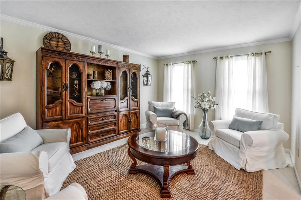 322 Stoup Road Mars, PA 16046 - Photo 14 of 25 a living room with furniture and a large window
